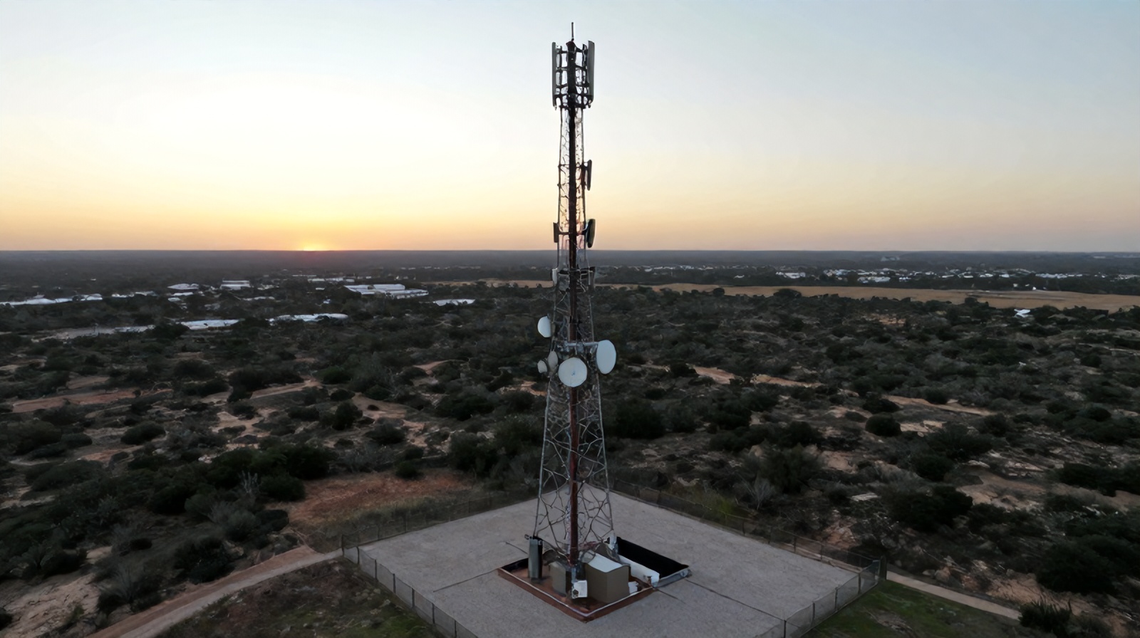 Aerial oblique view of a cell phone tower in Central Texas during a drone inspection