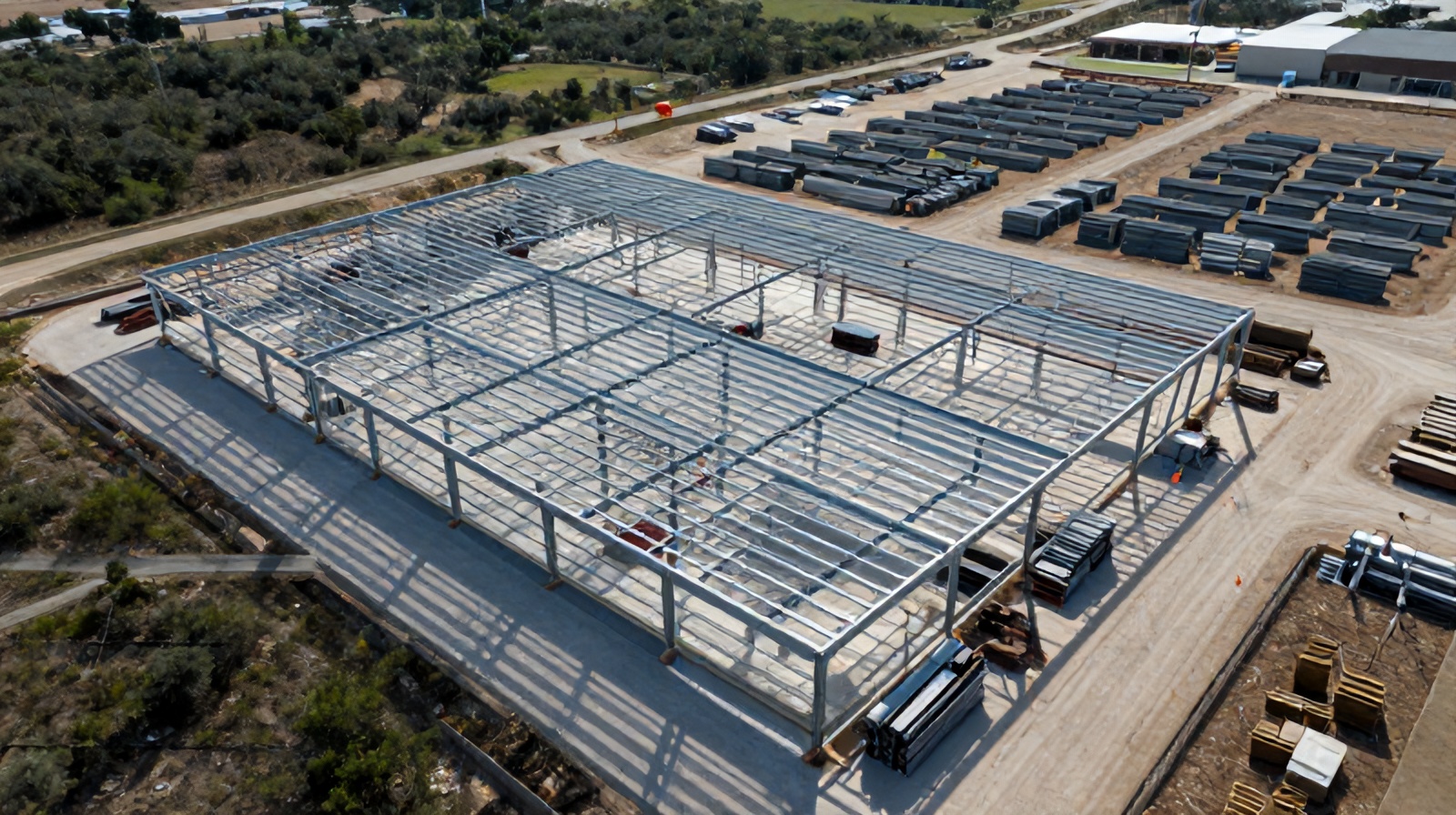 Close aerial view of a steel-frame building under construction near Austin used for progress-tracking data analysis
