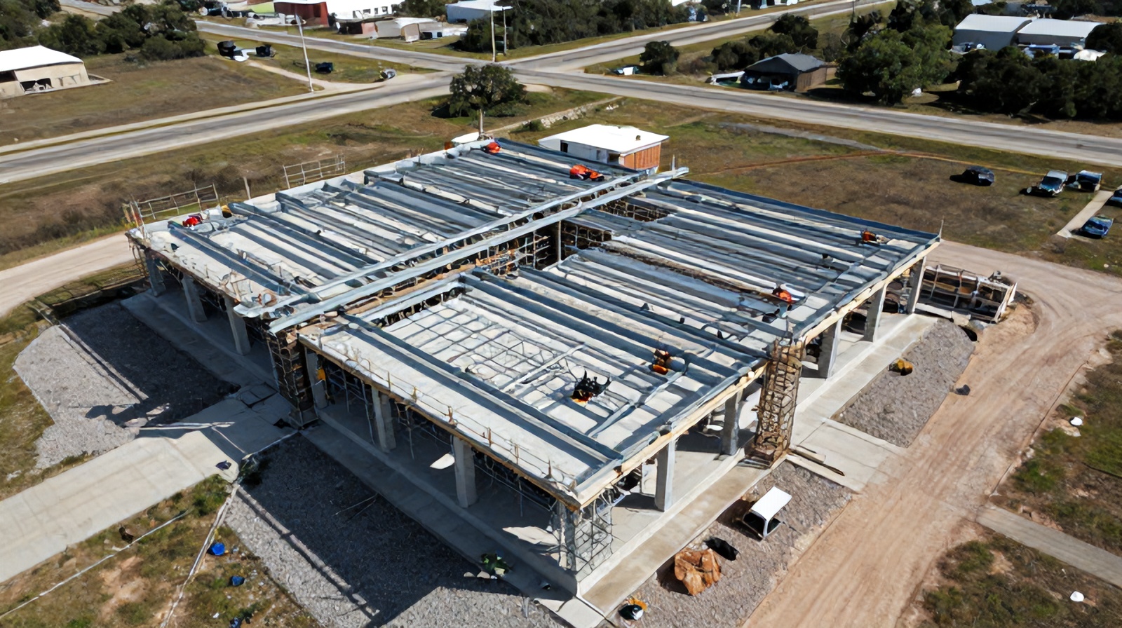 Close oblique aerial shot of a building under construction captured for photogrammetry mesh modeling