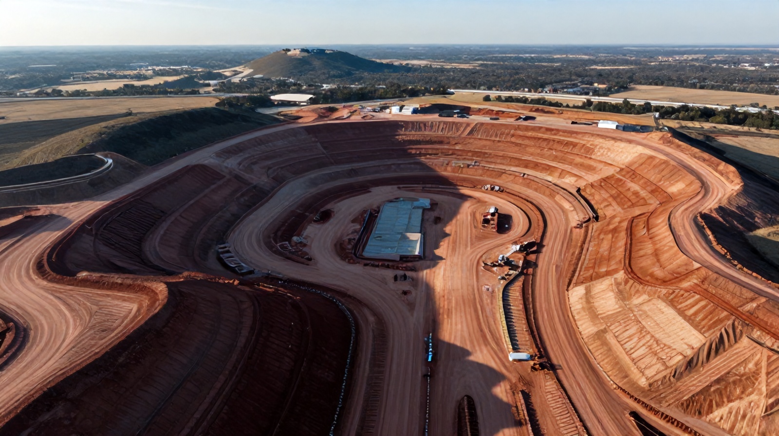 Top-down aerial view of a graded cut-and-fill earthwork site in Central Texas used for drone photogrammetry volume calculations
