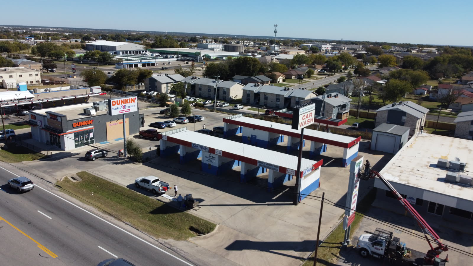 Aerial view of an active commercial construction site captured by drone for a progress report