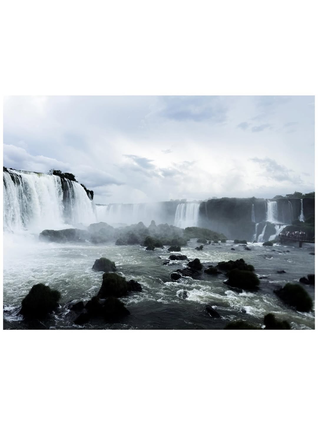 Nature Documentary - Dramatic waterfalls cascading through misty landscape